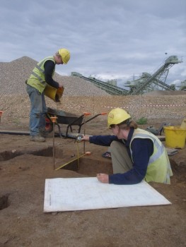 Archaeologist undertake recording on an archaeological site.