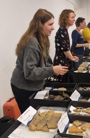 Elle Norrish on the marketstall of prehistoric pottery