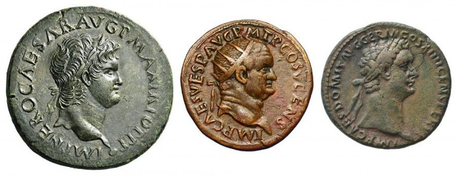 A composite image of three Roman coins of varying colours on a white background.